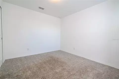 Bedroom - 4549 Burrowing Owl Loop, Saint Cloud, FL 34772 photo 4 of 10