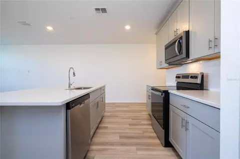Kitchen - 4549 Burrowing Owl Loop, Saint Cloud, FL 34772 photo 7 of 9