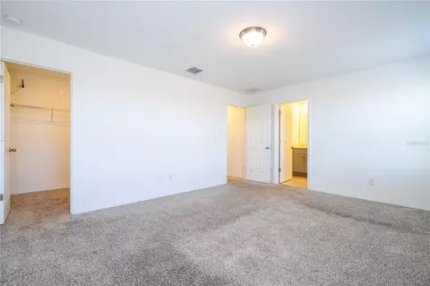 Bedroom - 4549 Burrowing Owl Loop, Saint Cloud, FL 34772 photo 9 of 10