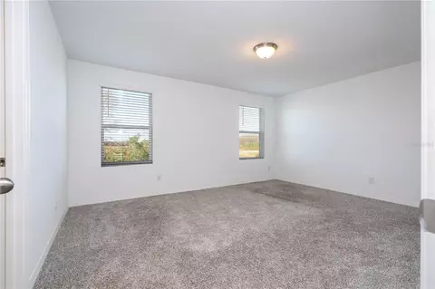 Bedroom - 4549 Burrowing Owl Loop, Saint Cloud, FL 34772 photo 7 of 10