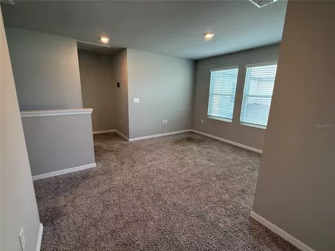 Living - 5264 Stephs Field St, Saint Cloud, FL 34771 photo 2 of 5