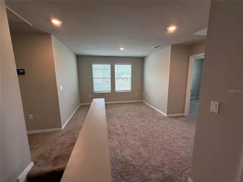 Living - 5264 Stephs Field St, Saint Cloud, FL 34771 photo 4 of 5