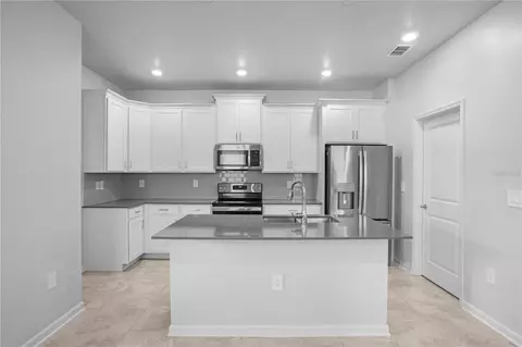 Kitchen - 6449 Sprucepine Ln, Saint Cloud, FL 34771 photo 2 of 4