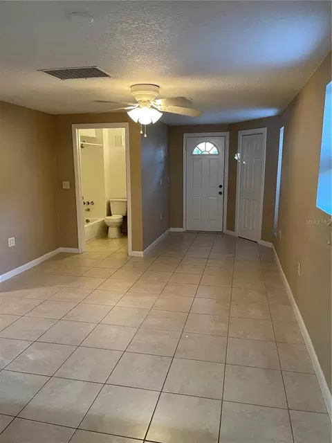 Living - 206 Osceola Ave, Eustis, FL 32726 photo 2 of 5