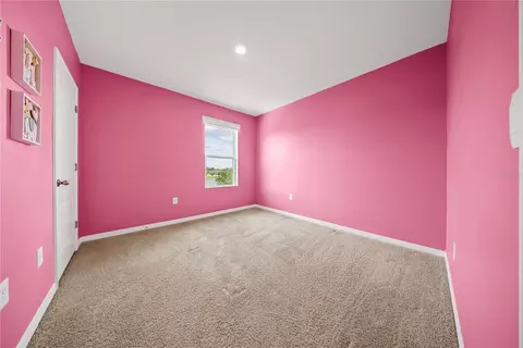 Bedroom - 6798 Grace Hammock Rd, Harmony, FL 34773 photo 3 of 9