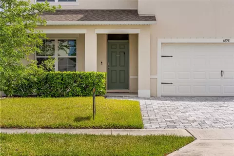 Exterior - 6798 Grace Hammock Rd, Harmony, FL 34773 photo 7 of 14