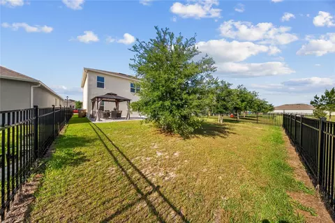 Exterior - 6798 Grace Hammock Rd, Harmony, FL 34773 photo 12 of 14