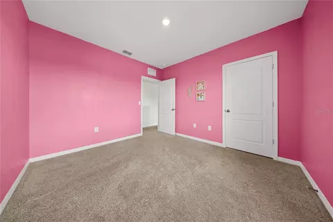 Bedroom - 6798 Grace Hammock Rd, Harmony, FL 34773 photo 4 of 9