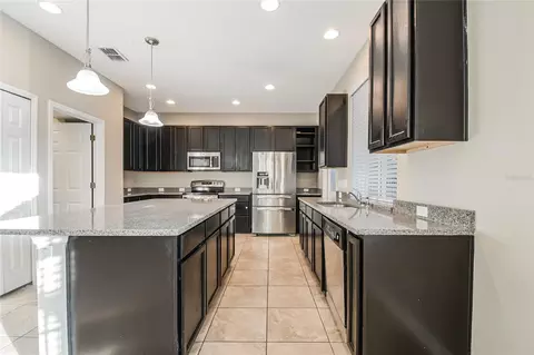 Kitchen - 6844 Sundrop St, Harmony, FL 34773 photo 5 of 5