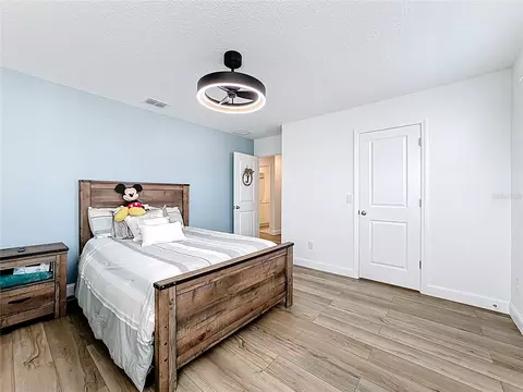 Bedroom - 5734 Cattle Ranch Dr, Saint Cloud, FL 34771 photo 7 of 12