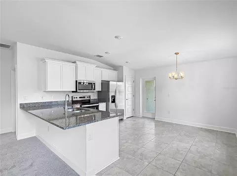 Kitchen - 7625 Bent Tree Loop, Saint Cloud, FL 34773 photo 1 of 2