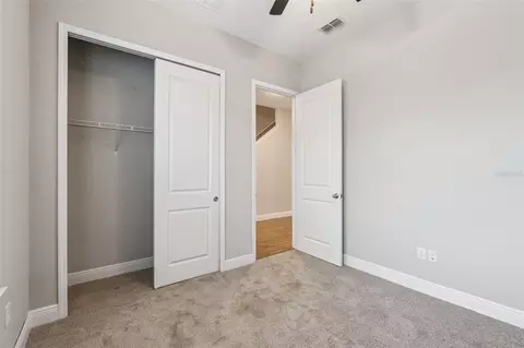 Bedroom - 6447 Cyrils Dr, Saint Cloud, FL 34771 photo 4 of 8