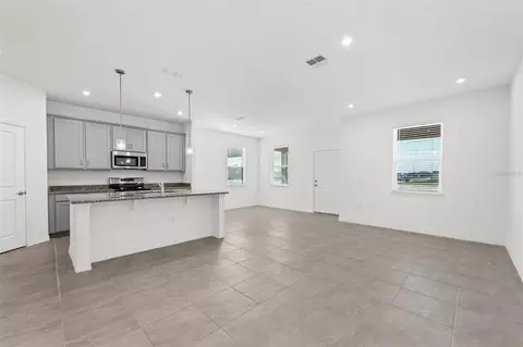 Living - 5754 Stockade Blvd, Saint Cloud, FL 34771 photo 5 of 5