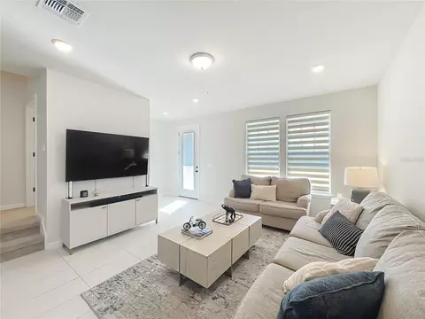 Living - 10976 Leafshore Loop, Orlando, FL 32829 photo 4 of 6