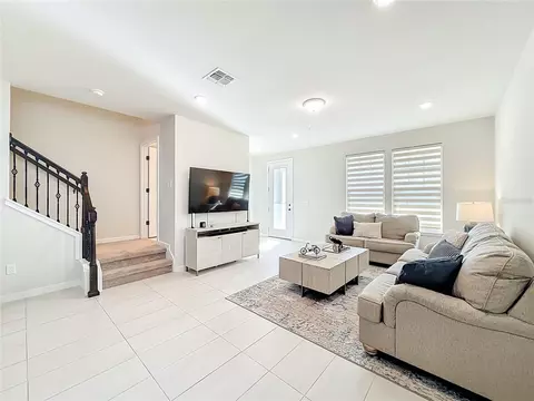 Living - 10976 Leafshore Loop, Orlando, FL 32829 photo 5 of 6
