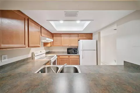 Kitchen - 404 E Orlando Ave #1B, Ocoee, FL 34761 photo 2 of 3