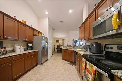 Kitchen - 6518 Crescent Loop, Winter Haven, FL 33884 photo 2 of 2
