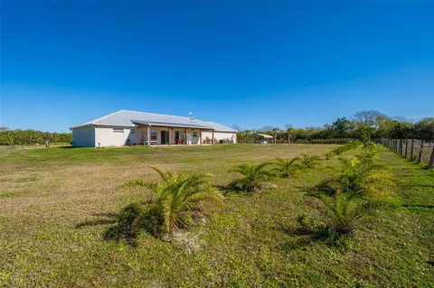 Exterior - 3440 Hammock Rd, Mims, FL 32754 photo 5 of 13