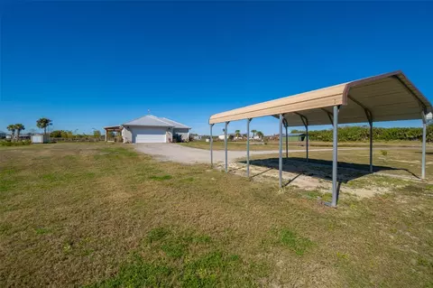 Exterior - 3440 Hammock Rd, Mims, FL 32754 photo 8 of 13