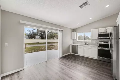 Kitchen - 3339 Queens Cove Loop, Winter Haven, FL 33880 photo 2 of 2