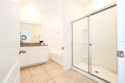 Bath - 7560 Oakmoss Loop, Davenport, FL 33837 photo 1 of 7