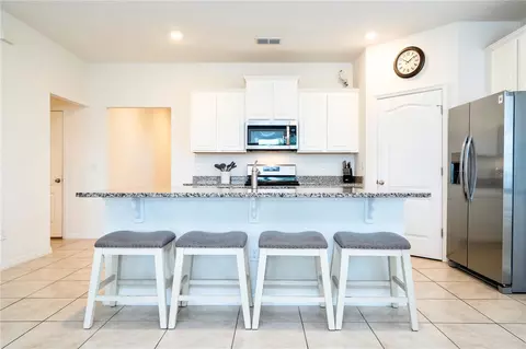 Kitchen - 7560 Oakmoss Loop, Davenport, FL 33837 photo 1 of 2