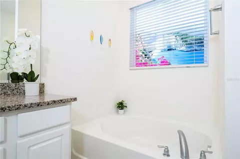 Bath - 7560 Oakmoss Loop, Davenport, FL 33837 photo 2 of 7