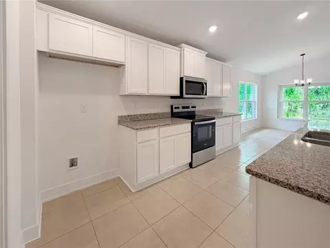 Kitchen - 7618 Bent Tree Loop, Harmony, FL 34773 photo 2 of 2