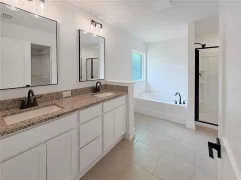 Bath - 7618 Bent Tree Loop, Harmony, FL 34773 photo 2 of 4