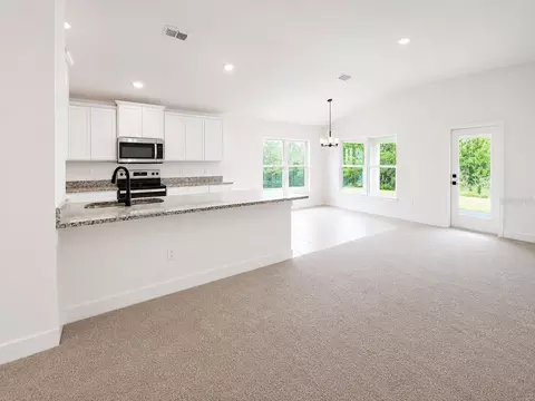 Living - 7618 Bent Tree Loop, Harmony, FL 34773 photo 1 of 3