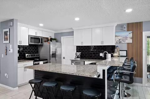 Kitchen - 874 Acadia Rd, Venice, FL 34293 photo 3 of 5