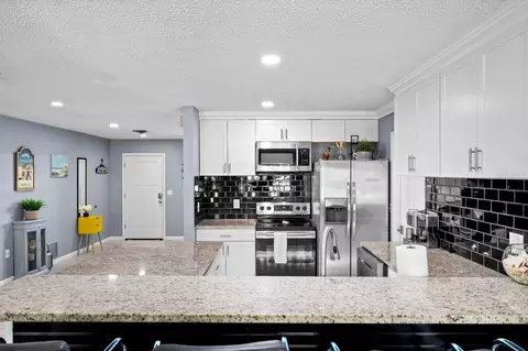 Kitchen - 874 Acadia Rd, Venice, FL 34293 photo 4 of 5