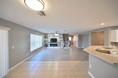 Living - 10922 Subtle Trail Dr, Riverview, FL 33579 photo 5 of 9