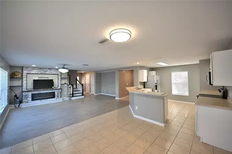 Living - 10922 Subtle Trail Dr, Riverview, FL 33579 photo 6 of 9