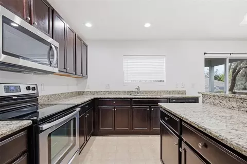 Kitchen - 10920 Pond Pine Dr, Riverview, FL 33569 photo 1 of 2