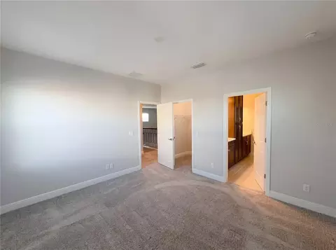 Bedroom - 11277 Rustic Timber Loop, San Antonio, FL 33576 photo 5 of 9