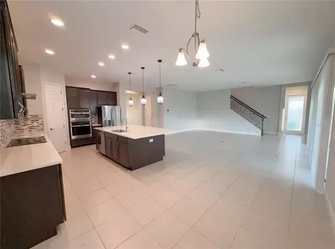 Living - 11277 Rustic Timber Loop, San Antonio, FL 33576 photo 5 of 9
