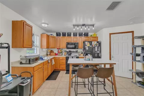 Kitchen - 4750 Rummell Rd, Saint Cloud, FL 34771 photo 7 of 8