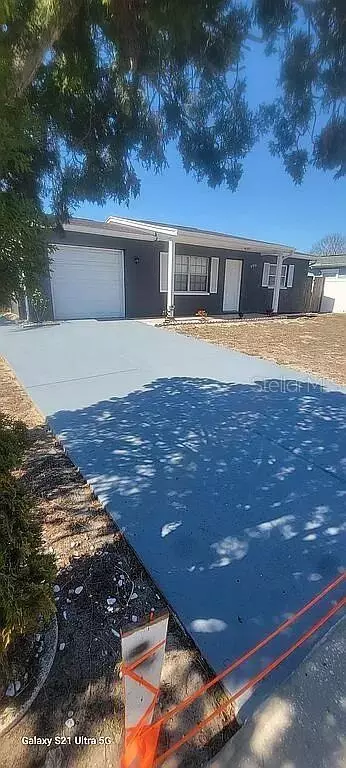 9901 Woodstock Ln, Port Richey, FL 34668