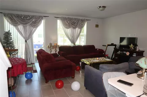 Living - 2063 Harebell Ln, Ocoee, FL 34761 photo 1 of 2