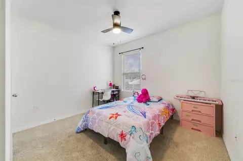Bedroom - 2135 E Old Mill Dr, Deltona, FL 32725 photo 3 of 7