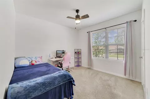 Bedroom - 2135 E Old Mill Dr, Deltona, FL 32725 photo 4 of 7