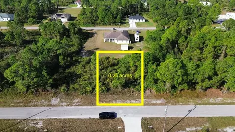 710 Randall Ave E, Lehigh Acres, FL 33974 photo 1