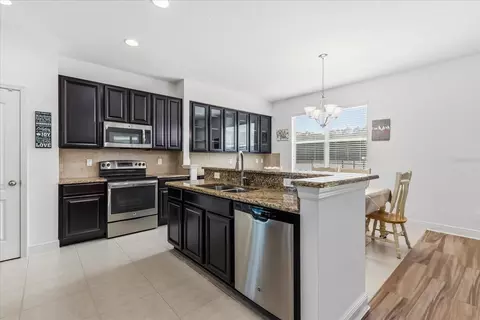 Kitchen - 10536 Cabbage Tree Loop, Orlando, FL 32825 photo 1 of 2