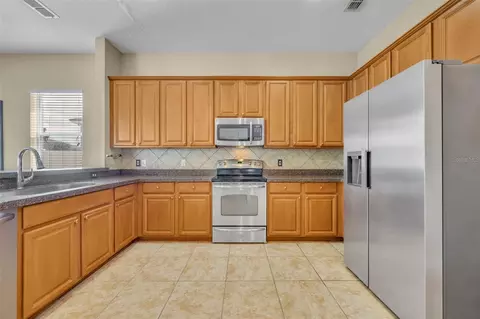 Kitchen - 5459 Rishley Run Way, Mount Dora, FL 32757 photo 1 of 3