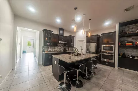 Kitchen - 4753 Riverwalk Dr, Saint Cloud, FL 34771 photo 3 of 4