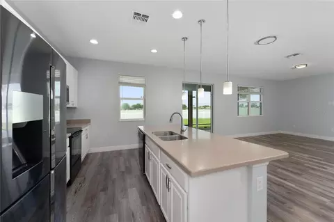 Kitchen - 12845 Sawgrass Pine Cir, Orlando, FL 32824 photo 2 of 2