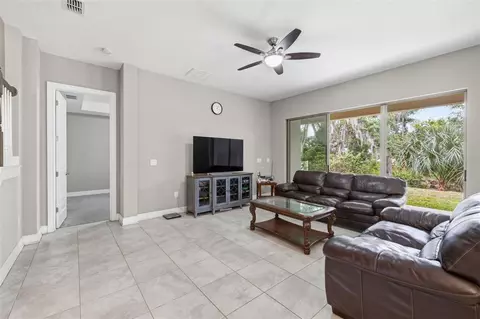 Living - 10431 Alcon Blue Dr, Riverview, FL 33578 photo 2 of 2