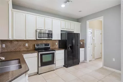 Kitchen - 722 Chacall Loop, Mount Dora, FL 32757 photo 2 of 2