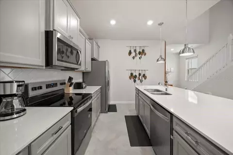 Kitchen - 15952 Cape Coral Loop, Clermont, FL 34714 photo 2 of 2